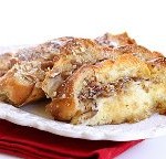Pastry slices on a plate with napkin.