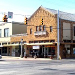 Historic brick building on a street corner.