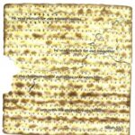 Text on matzah with Isaiah 53:5 quote.