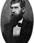Bearded man in formal 19th-century attire.