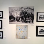 Gallery wall with framed historical photos.